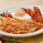 Fresh Cut Hash Browns Served with Bacon and Eggs