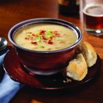 Bowl of Smoked Cheddar Amber Ale Soup