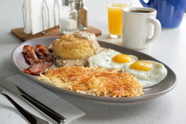 Biscuits & Gravy with Sunny Side Up Eggs & Bacon